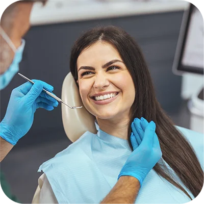 a woman in a dental chair